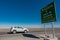 Tropic of Capricorn sign and blurred car in Atacama Desert, Chile - South America