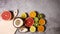 Tropic fruits appear and disappear next to cutting board - Stop motion