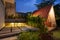 Tropical Backyard Garden at Night with Various of Plants