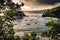 Tropical bay landscape with blue sea and small fishing boats. Exotic island landscape before sunset viewed from a hill overlooking