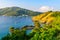 Tropical bay at Naiharn and Ao Sane beach with boats at windmill viewpoint, Paradise destination Phuket, Thailand