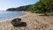 Tropical beach with boat in foreground