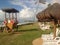 Tropical beach in the Brazil northeast. Kiosk, charis and the sea in the background.