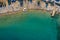 Tropical beach with colorful umbrellas - Top down aerial view. Lindos , Rhodes, Greece