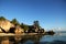 Tropical beach with granitic rocks and blue water