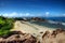 Tropical beach with granitic rocks and blue water