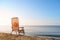 Tropical beach landscape with deckchair.