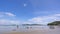 Tropical beach with LongTail boats in the sea blue sky and white clouds in summer season