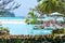 Tropical beach with palm trees. swimming pool in the foreground