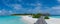 Tropical beach panorama view of the resort at Maldives