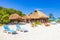 Tropical beach parasols sunbeds Punta Esmeralda Playa del Carmen Mexico