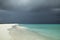 Tropical beach and strom clouds on Little CuraÃ§ao