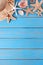 Tropical beach summer starfish background border vertical blue wood deck