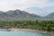 Tropical beach with volcano on background