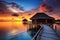 Tropical beach with water bungalows at sunset, Maldives, Water bungalow. Sunset on the islands of the Maldives. A place for dreams