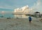 Tropical beach with wooden pier