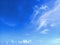 Tropical blue sky background with white clouds. Spectacular Caribbean sky with cirrus from the French West Indies