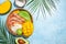 tropical bowl with avocado, prawns, rice, mango, kiwi and coconut, tropical food on the sea beach, Organic and healthy food, place