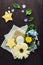 Tropical flowers and leaves with candle and gold stars