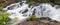 Tropical forest waterfall, panoramic shot, long exposure