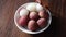 Tropical fruit Lychee known as Litchi chinensis berries on plate.