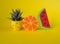 Tropical fruit paper on a yellow background - isolated. Top view.