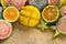 Tropical fruits mango, tangerine, guava, dragon fruit, star fruit, sapodilla on the wooden background.