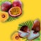 Tropical fruits on the yellow background