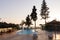 Tropical greek pool sunset tourist hotel luxury