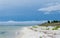 Tropical Gulf Coast ocean beach inlet landscape scene.