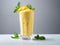 Tropical Indulgence: Mango Milkshake Bliss with a Minty Twist & Mango Slices