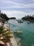 Tropical inlet, boats and palmtrees