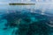 Tropical island in coral reef in Hol Chan Marine Reserve Belize