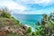 Tropical island landscape, ocean on a bacakground. Beautiful view from the cliff to the coast. Outdoor scenery, Bali