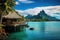 Tropical island with palm trees, bungalows and mountains, Bora Bora landscape