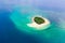 Tropical island in the sea. Travel concept: tropical sand beach and turquoise water view from the top.