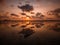 A Tropical Island Sunset with reflection on water - Koh Phangan / Thailand