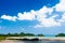 Tropical island and tranquil ocean view under summer blue sky