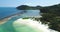 Tropical island white sandy beach aerial view