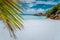 Tropical La Digue Island Seychelles, white beach with granit rocks and palm tree