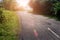 Tropical landscape with empty road and green roadside. Tropic forest travel by bike.