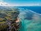 Tropical landscape with ocean and coastline in East Mauritius. Aerial view