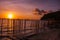 Tropical landscape at sunset. The fence and the sea. White beach. Boracay. Philippines.