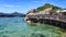 Tropical landskape. pier for boats between the rocks on the white beach of the Nang Yuan island