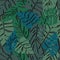 Tropical leaves seamless pattern on dark background. green palm leaves background.