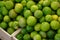 Tropical lime fruit on greengrocery fruit shop