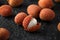 Tropical Lychee fruits, soapberry on rustic black table, background