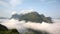 Tropical mountain over a valley filled with clouds - Nong Khiaw, Laos