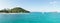 Tropical ocean and beach with sail boat yacht in the Tobago Cays, Saint Vincent and the Grenadines, Caribbean.