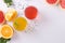 Tropical orange and grapefruit juice with basil seeds or falooda seeds or tukmaria in glass on white background, Closeup